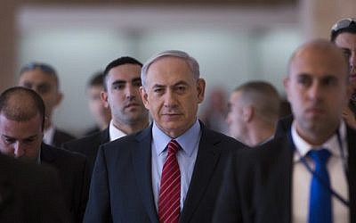 Head of the Likud party and Israel's Prime Minister Benjamin Netanyahu arrives at a Likud faction meeting at the Knesset on December 3, 2014 (Photo credit: Yonatan Sindel/Flash90)