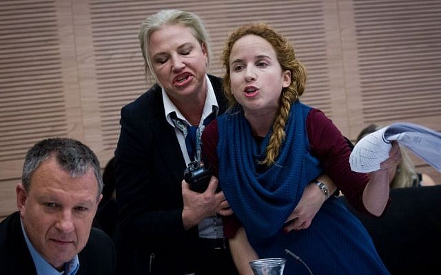 Labor's Stav Shaffir is ejected from the December 8, 2014, Finance Committee meeting. Photo by Miriam Alster/FLASH90