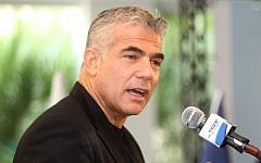 Yesh Atid chief Yair Lapid on December 12, 2014 (Photo credit: Flash90)