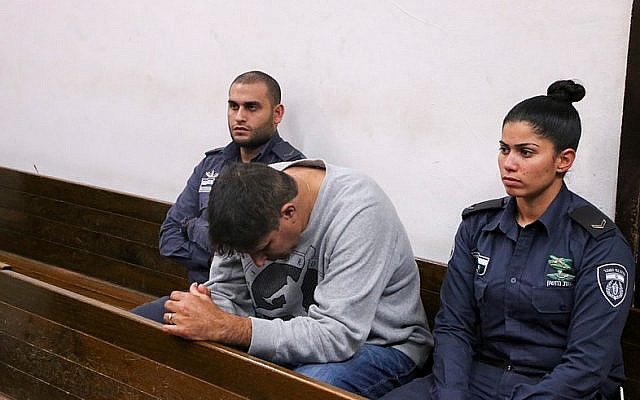 Hapoel Petah Tikva soccer team manager Ofer Tzabari arrives at his hearing at the Tel Aviv Magistrate's Court on December 17, 2014. (Photo credit: Flash 90) Hapoel Petah Tikva soccer team manager Ofer Tzabari arrives at his hearing at the Tel Aviv Magistrate's Court on December 17, 2014. (Photo credit: Flash 90)