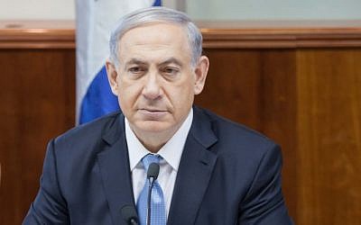 Prime Minister Benjamin Netanyahu at the weekly cabinet meeting, December 21, 2014 (photo credit: Emil Salman/pool)