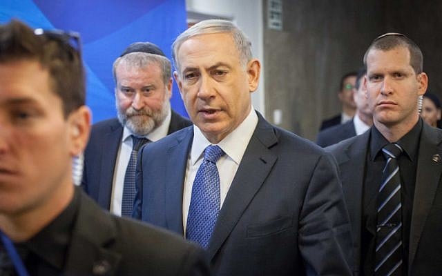 Prime Minister Benjamin Netanyahu arrives to the weekly cabinet meeting on Sunday, December 28, 2014. (photo credit: Emil Salman/POOL) Prime Minister Benjamin Netanyahu arrives to the weekly cabinet meeting on Sunday, December 28, 2014. (photo credit: Emil Salman/POOL)