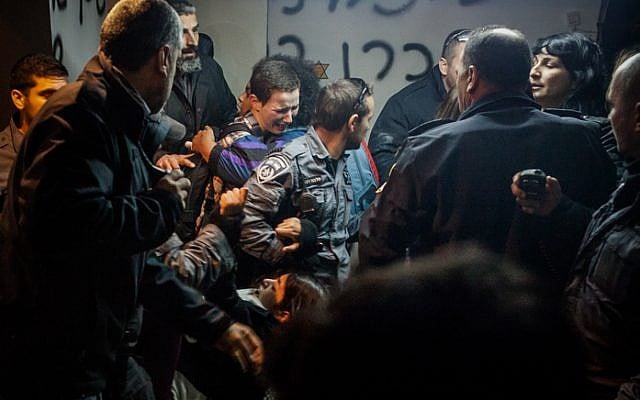 Police clash with Givat Amal residents on December 29, 2014 (photo credit: Amir Levi/Flash90)