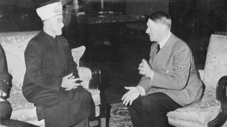 Hitler hosts Grand Mufti Haj Amin al-Husseini in 1941 in Germany. (Heinrich Hoffmann Collection/Wikipedia) Hitler hosts Grand Mufti Haj Amin al-Husseini in 1941 in Germany. (Heinrich Hoffmann Collection/Wikipedia)