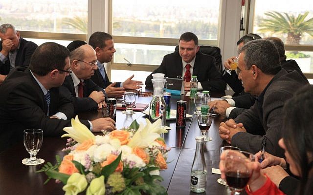 The Knesset faction leaders meet with Knesset Speaker Yuli Edelstein to set an election date. December 3, 2014. (photo credit: Knesset spokesperson's office) The Knesset faction leaders meet with Knesset Speaker Yuli Edelstein to set an election date. December 3, 2014. (photo credit: Knesset spokesperson's office)