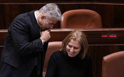 Yesh Atid MK Yair Lapid (L) and Hatnua MK Tzipi Livni (R) at the Knesset on December 3, 2014. (photo credit: Courtesy)