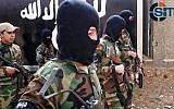 File: Children are seen receiving military training in an Islamic State camp near Damascus, Syria, December 6, 2014. (SITE Intel Group)
