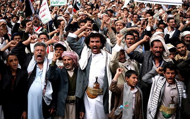 In this Thursday, October 9, 2014 file photo, Houthi Shiite rebels chant slogans during a protest near the site of a suicide bombing in Sanaa, Yemen. (Photo credit: AP/Abdullrhman Huwais, File) In this Thursday, October 9, 2014 file photo, Houthi Shiite rebels chant slogans during a protest near the site of a suicide bombing in Sanaa, Yemen. (Photo credit: AP/Abdullrhman Huwais, File)
