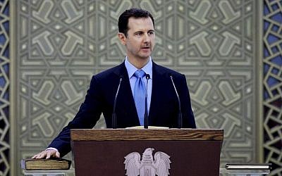 In this Wednesday, July 16, 2014 file photo released by the Syrian official news agency SANA, Syria's President Bashar Assad is sworn for his third, seven-year term, in Damascus, Syria (AP/SANA, File) In this Wednesday, July 16, 2014 file photo released by the Syrian official news agency SANA, Syria's President Bashar Assad is sworn for his third, seven-year term, in Damascus, Syria (AP/SANA, File)