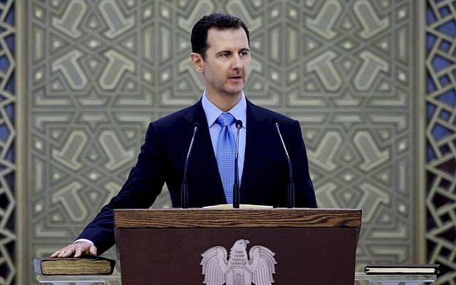 In this Wednesday, July 16, 2014 file photo released by the Syrian official news agency SANA, Syria's President Bashar Assad is sworn for his third, seven-year term, in Damascus, Syria (AP/SANA, File) In this Wednesday, July 16, 2014 file photo released by the Syrian official news agency SANA, Syria's President Bashar Assad is sworn for his third, seven-year term, in Damascus, Syria (AP/SANA, File)