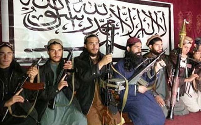 Photo released by the Pakistani Taliban on Wednesday, Dec. 17, 2014 showing the Taliban fighters who stormed a military-run school in Peshawar, Pakistan killing more than 140 people, most of them children. (photo credit: AP/Pakistani Taliban handout) Photo released by the Pakistani Taliban on Wednesday, Dec. 17, 2014 showing the Taliban fighters who stormed a military-run school in Peshawar, Pakistan killing more than 140 people, most of them children. (photo credit: AP/Pakistani Taliban handout)