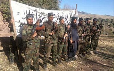 An earlier photo released by the Pakistani Taliban on Wednesday, Dec. 17, 2014 shows the Taliban fighters who stormed a military-run school in Peshawar, Pakistan on Tuesday, killing more than 140 people, most of them children. (photo credit: AP/Pakistani Taliban handout) An earlier photo released by the Pakistani Taliban on Wednesday, Dec. 17, 2014 shows the Taliban fighters who stormed a military-run school in Peshawar, Pakistan on Tuesday, killing more than 140 people, most of them children. (photo credit: AP/Pakistani Taliban handout)