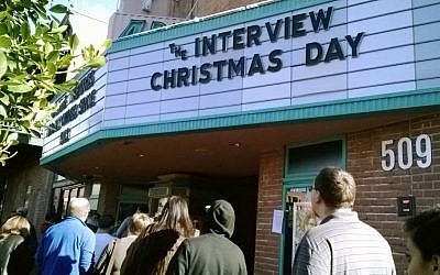 Patrons waiting in line to see 'The Interview' at the Valley Art theater in Tempe, Arizona, December 25, 2014. (photo credit: AP/Alina Hartounian)