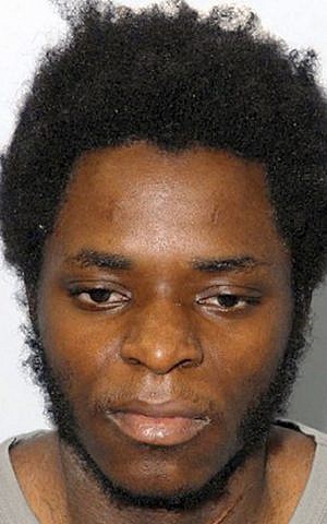This undated file image released by the Metropolitan Police shows one of Lee Rigby's killers, Michael Adebowale. (photo credit: AP Photo/Metropolitan Police, File) 