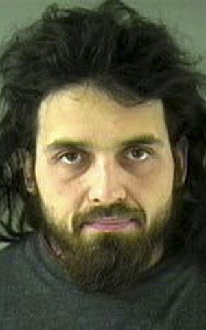  This undated file image provided by the Royal Canadian Mounted Police shows Michael Zehaf-Bibeau, 32, who shot a soldier to death at Canada's national war memorial day on Wednesday, Oct. 22, 2014. (photo credit: AP Photo/Vancouver Police via The Royal Canadian Mounted Police, File)