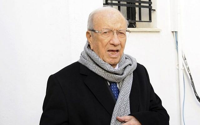 President Beji Caid Essebsi, an 88-year-old former minister, leaves his party headquarters in Tunis, December 22, 2014. (photo credit: AP/Hassene Dridi) President Beji Caid Essebsi, an 88-year-old former minister, leaves his party headquarters in Tunis, December 22, 2014. (photo credit: AP/Hassene Dridi)
