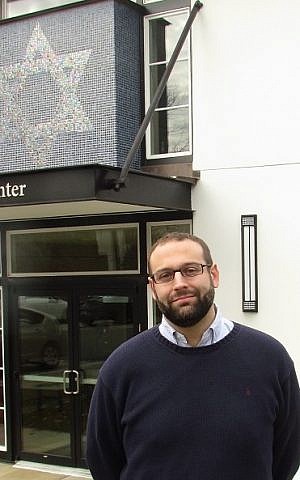 Jake Rubin, the director of the University of Virginia Hillel, on Dec. 4, 2014 in front of the Hillel building in the vRugby Road neighborhood of Charlottesville, Va. (Ron Kampeas/JTA)