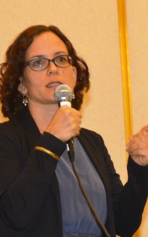Jerusalem Deputy Mayor Rachel Azaria addresses attendees at an international conference on the Orthodox Jewish community confronting violence and abuse. December 1, 2014. (photo credit: Sharon Altshul) Jerusalem Deputy Mayor Rachel Azaria addresses attendees at an international conference on the Orthodox Jewish community confronting violence and abuse. December 1, 2014. (photo credit: Sharon Altshul)