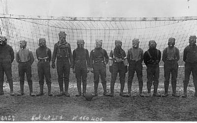 A World War I British soccer team with gas masks, 1916 (photo ccredit: Agence Rol - Bibliothèque nationale de France/ Wikipedia)