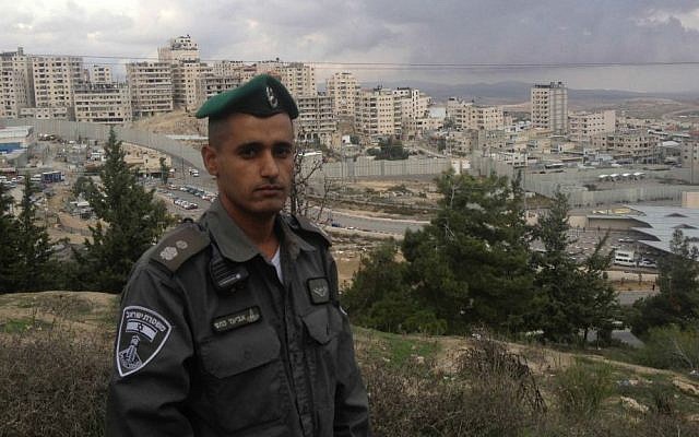 Chief Superintendant Aviad Ketafi, above the Shuafat Refugee Camp, during a November 25, 2014 tour of the city (photo credit: Mitch Ginsburg/ Times of Israel) Chief Superintendant Aviad Ketafi, above the Shuafat Refugee Camp, during a November 25, 2014 tour of the city (photo credit: Mitch Ginsburg/ Times of Israel)