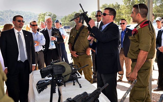 Ashton B. Carter, second from right, examines one of the weapons of the Israel Defense Force at a display at Mitkan Adam Army Base in Israel on July 21, 2013. (photo credit: Sgt. Aaron Hostutler, US Marine Corps/Department of Defense)