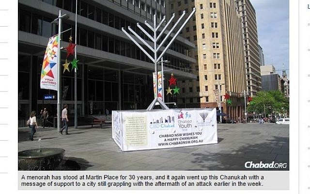 Screenshot of the 32-foot menorah set up in Martin Place in Sydney, Australia, December 2014. (Photo credit: Chabad.org/screen capture) Screenshot of the 32-foot menorah set up in Martin Place in Sydney, Australia, December 2014. (Photo credit: Chabad.org/screen capture)