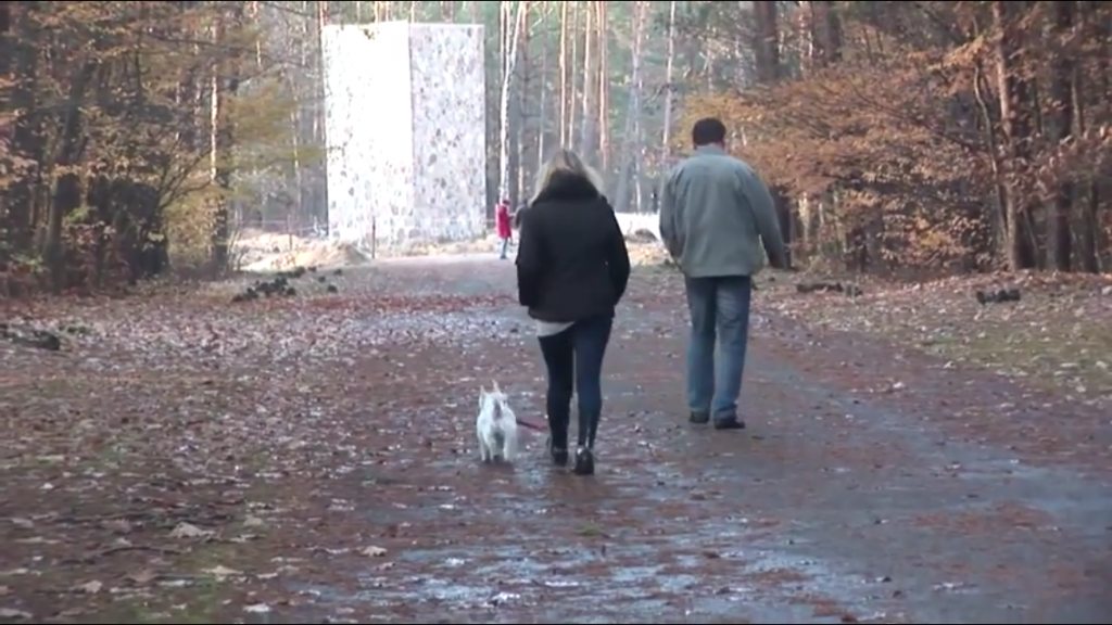 At the former Nazi death camp Sobibor, in eastern Poland, a visitor walks a dog through the area of the recently excavated gas chambers, in this Nov. 11, 2014 photo. (photo credit: Lena Klaudel) At the former Nazi death camp Sobibor, in eastern Poland, a visitor walks a dog through the area of the recently excavated gas chambers, in this Nov. 11, 2014 photo. (photo credit: Lena Klaudel)