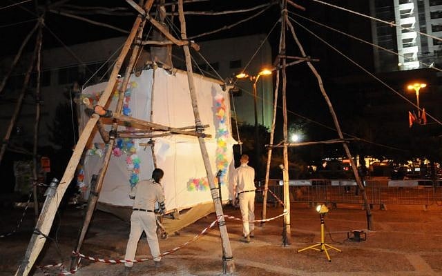 Scouts in Ramat Gan unveil the world's largest dreidel during a 2014 Hanukkah ceremony (photo credit: Anat Sudai Alaloof)