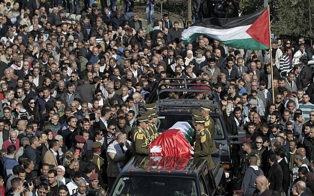 Palestinian security members drive with the coffin of senior Palestinian official Ziad Abu Ein during his funeral in the West Bank city of Ramallah on December 11, 2014. (Photo credit: AFP/ AHMAD GHARABLI) Palestinian security members drive with the coffin of senior Palestinian official Ziad Abu Ein during his funeral in the West Bank city of Ramallah on December 11, 2014. (Photo credit: AFP/ AHMAD GHARABLI)