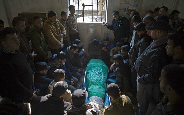 The December 24, 2014 Gaza funeral of Tayseir Smeiry, a Hamas operative, who was killed by Israeli troops after gunmen from Gaza opened fire on an IDF force within Israel (photo credit: AP Photo/ Khalil Hamra) The December 24, 2014 Gaza funeral of Tayseir Smeiry, a Hamas operative, who was killed by Israeli troops after gunmen from Gaza opened fire on an IDF force within Israel (photo credit: AP Photo/ Khalil Hamra)