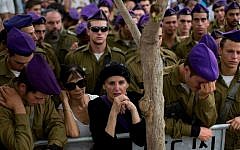 Soldiers from the Givati Brigade attend the funeral of Lt. Hadar Goldin at the Kfar Saba cemetery on August 3, 2014. (Oded Balilty/AP Photo)