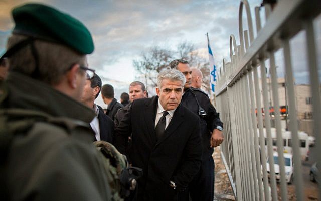Finance Minister Yair Lapid with Border Police on a November 23, 2014 tour of Meir Nakar Street, where Jabel Mukaber and Armon Hanatziv meet (photo credit: Yonantan Sindel/ Flash 90) Finance Minister Yair Lapid with Border Police on a November 23, 2014 tour of Meir Nakar Street, where Jabel Mukaber and Armon Hanatziv meet (photo credit: Yonantan Sindel/ Flash 90)