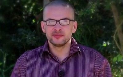 Luke Somers, an American photojournalist born in Britain, is seen in a video posted online by an al-Qaeda affiliated group in Yemen which has been holding him hostage for over a year in December 2014. (photo credit: YouTube screen grab)