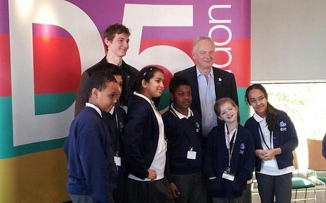 UK Cabinet Office Minister Francis Maude with young participants in a computer coding contest at the D5 Forum in London, December 9, 2014 (Photo credit: Courtesy) UK Cabinet Office Minister Francis Maude with young participants in a computer coding contest at the D5 Forum in London, December 9, 2014 (Photo credit: Courtesy)