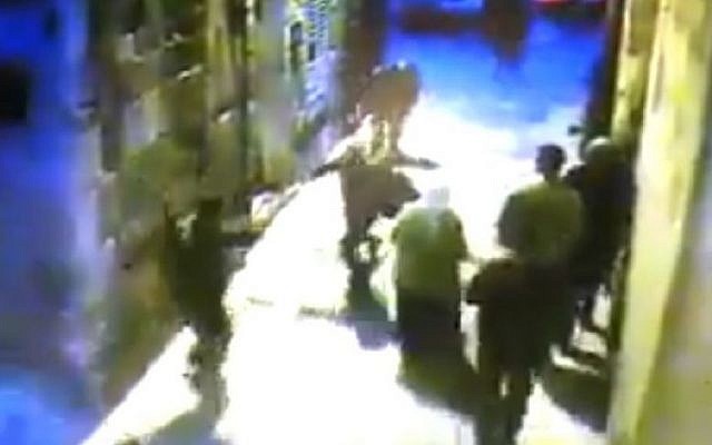 CCTV footage shows a Palestinian man attacking two Border Policemen in Jerusalem's Old City on December 26, 2014. (photo credit: screenshot) CCTV footage shows a Palestinian man attacking two Border Policemen in Jerusalem's Old City on December 26, 2014. (photo credit: screenshot)
