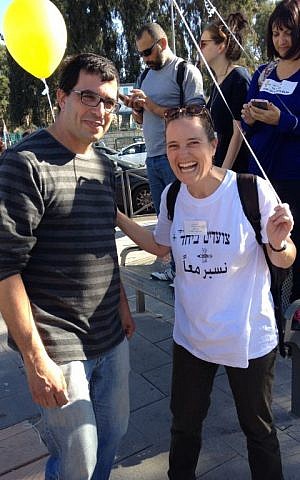 Hand in Hand development director Rebecca Bardach and a school supporter (photo credit: Jessica Steinberg/Times of Israel)