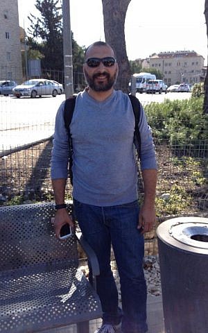 Mohamed Marzouk, from Hand in Hand in Kfar Qara, who sent all three of his children to the bilingual school (photo credit: Jessica Steinberg/Times of Israel)
