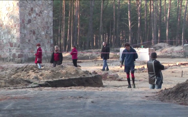 Visitors to the former Nazi death camp Sobibor, in eastern Poland, wander through the recently excavated remains of the gas chambers on Nov. 11, 2014. (photo credit: Lena Klaudel) Visitors to the former Nazi death camp Sobibor, in eastern Poland, wander through the recently excavated remains of the gas chambers on Nov. 11, 2014. (photo credit: Lena Klaudel)