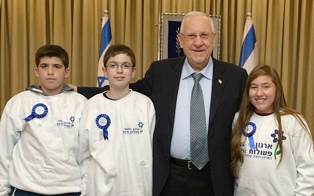 President Reuven Rivlin during a bar/bat mitzvah celebration with children who survived terror attacks, on December 29, 2014. Photo by Mark Neyman/GPO President Reuven Rivlin during a bar/bat mitzvah celebration with children who survived terror attacks, on December 29, 2014. Photo by Mark Neyman/GPO