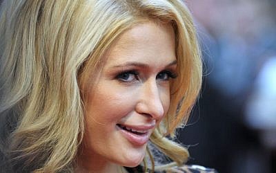 American socialite Paris Hilton. (Photo credit: a href="http://www.shutterstock.com/pic-166543106/stock-photo-moscow-november-paris-hilton-visits-quot-june-quot-shopping-mall-near-moscow-to-unveil-her.html?src=Cf7D-kK8SQAknhI_zAXOJg-1-0" rel="external">Paris Hilton image via Shutterstock)