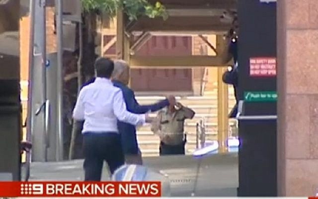 Screenshot from Australian TV showing hostage situation in Sydney Australia, December 15, 2014. Screenshot from Australian TV showing hostage situation in Sydney Australia, December 15, 2014.