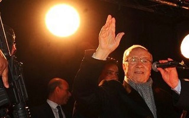 Tunisian presidential candidate Beji Caid Essebsi gives a speech in front his supporters after the second round of the country's presidential election, in Tunis, Sunday, Dec. 21, 2014. (photo credit: AP Photos/Hassene Dridi)