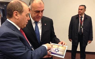 National Infrastructure and Energy Minister Silvan Shalom meets with Azeri Foreign Minister Elmar Mammadyarov on the sidelines of a ceremony marking 70 years to the liberation of Auschwitz, in Oswiecim, Poland, on Tuesday January 27, 2015. (photo credit: Courtesy National Infrastructure and Energy Ministry)