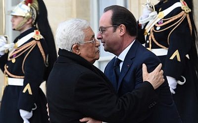 French President Francois Hollande welcomes Palestinian Authority President Mahmoud Abbas at the Elysee Palace before attending a unity rally “Marche Republicaine” on January 11, 2015 in Paris in tribute to the 17 victims of a three-day killing spree by homegrown Islamists. (Photo credit: AFP/ DOMINIQUE FAGET French President Francois Hollande welcomes Palestinian Authority President Mahmoud Abbas at the Elysee Palace before attending a unity rally “Marche Republicaine” on January 11, 2015 in Paris in tribute to the 17 victims of a three-day killing spree by homegrown Islamists. (Photo credit: AFP/ DOMINIQUE FAGET