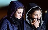 Italian aid workers abducted in Syria last summer, Greta Ramelli (L) and Vanessa Marzullo arrive at Ciampino airport in Rome early on January 16, 2015. (photo credit: AFP PHOTO / FILIPPO MONTEFORTE)