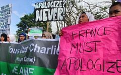 Filipino Muslim students, religious and community leaders stage a protest in Marawi City in southern Philippines on January 14, 2015.  (Photo credit: AFP/ MARK NAVALES)