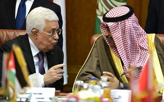 Palestinian Authority President Mahmoud Abbas (L) talks to Kuwaiti Foreign Minister Sabah al-Khaled al-Sabah during a meeting at the Arab League headquarters in Cairo on January 15, 2015. (photo credit: Mohamed el-Shahed/AFP) Palestinian Authority President Mahmoud Abbas (L) talks to Kuwaiti Foreign Minister Sabah al-Khaled al-Sabah during a meeting at the Arab League headquarters in Cairo on January 15, 2015. (photo credit: Mohamed el-Shahed/AFP)