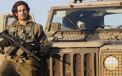 Israeli troops patrol the Golan Heights on January 18, 2015. (photo credit: Jlaa Marey/AFP) 