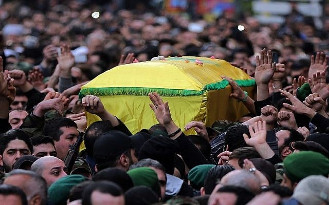 Hezbollah supporters carry the coffin of militant Jihad Mughniyeh during his funeral in a southern Beirut suburb on January 19, 2015. (photo credit: AFP PHOTO /JOSEPH EID) Hezbollah supporters carry the coffin of militant Jihad Mughniyeh during his funeral in a southern Beirut suburb on January 19, 2015. (photo credit: AFP PHOTO /JOSEPH EID)