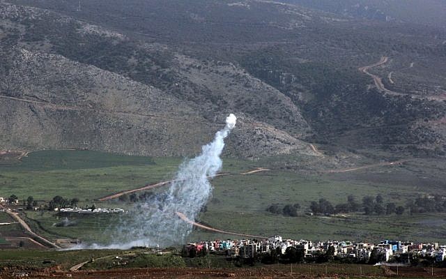 Smoke from Israeli shelling covers the Lebanese town of Al-Majidiyah on the Lebanese border with Israel on January 28, 2015. (photo credit:AFP/ALI DIA) Smoke from Israeli shelling covers the Lebanese town of Al-Majidiyah on the Lebanese border with Israel on January 28, 2015. (photo credit:AFP/ALI DIA)